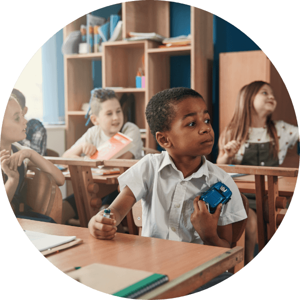 A group of children in a classroom.